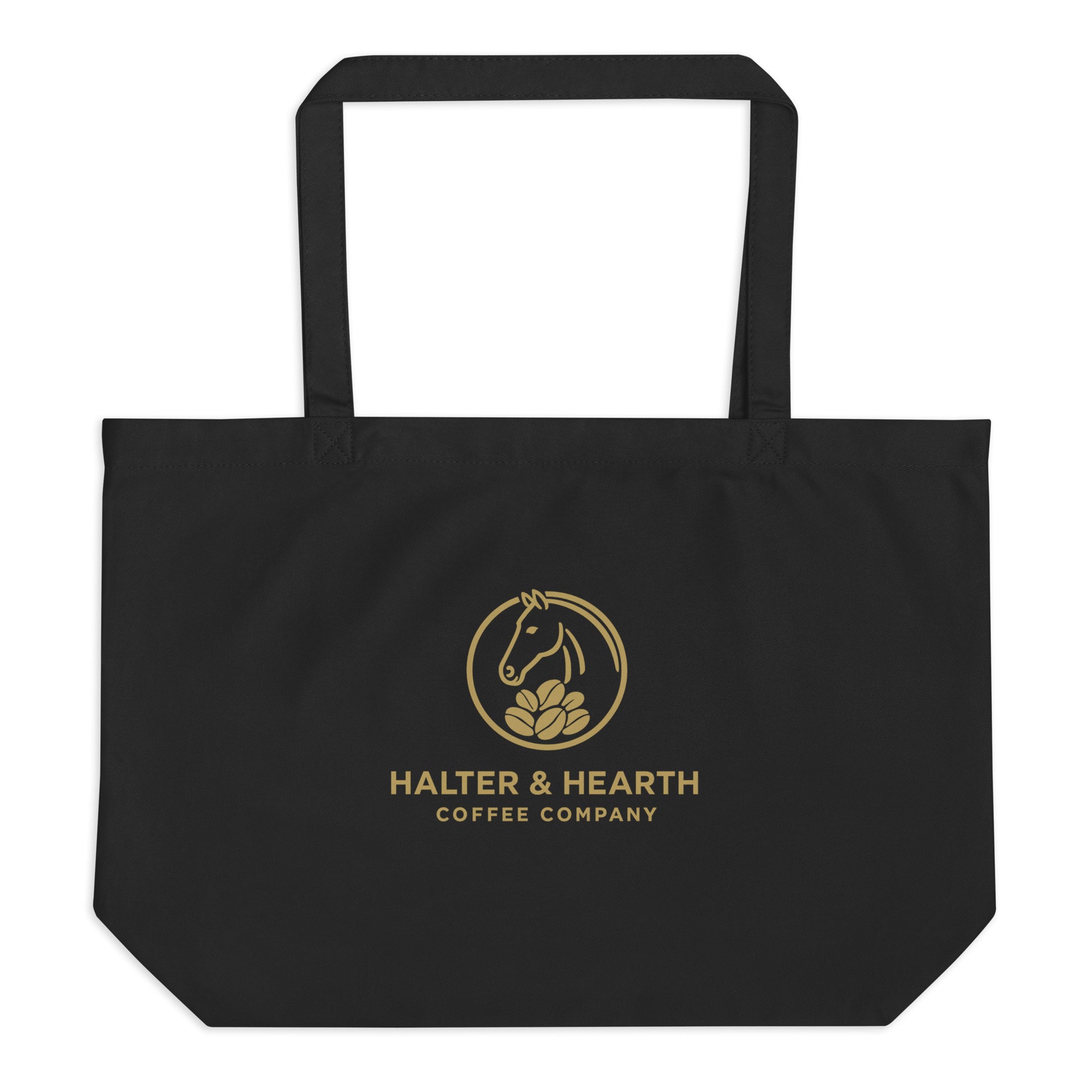 Halter & Hearth black tote bag with gold logo and a white background. 